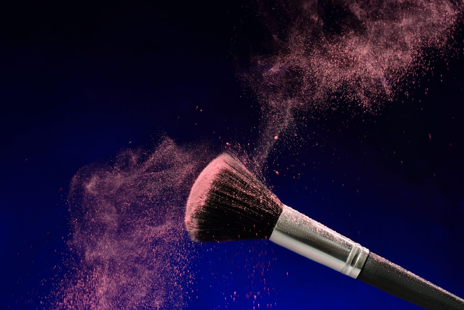 Makeup brush with pink blush