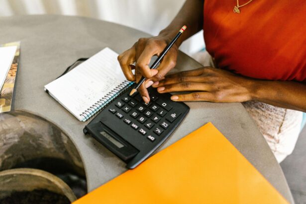 Woman doing calculations on her calculator